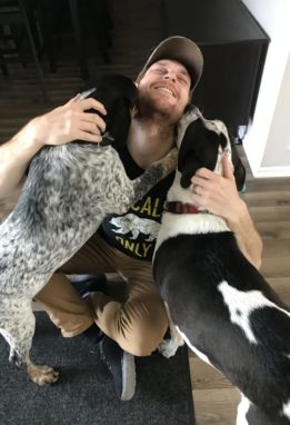 Man with two dogs