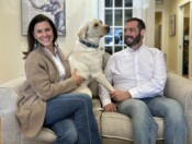 Liz Wade and Peter Glionna with Folsey the yellow lab