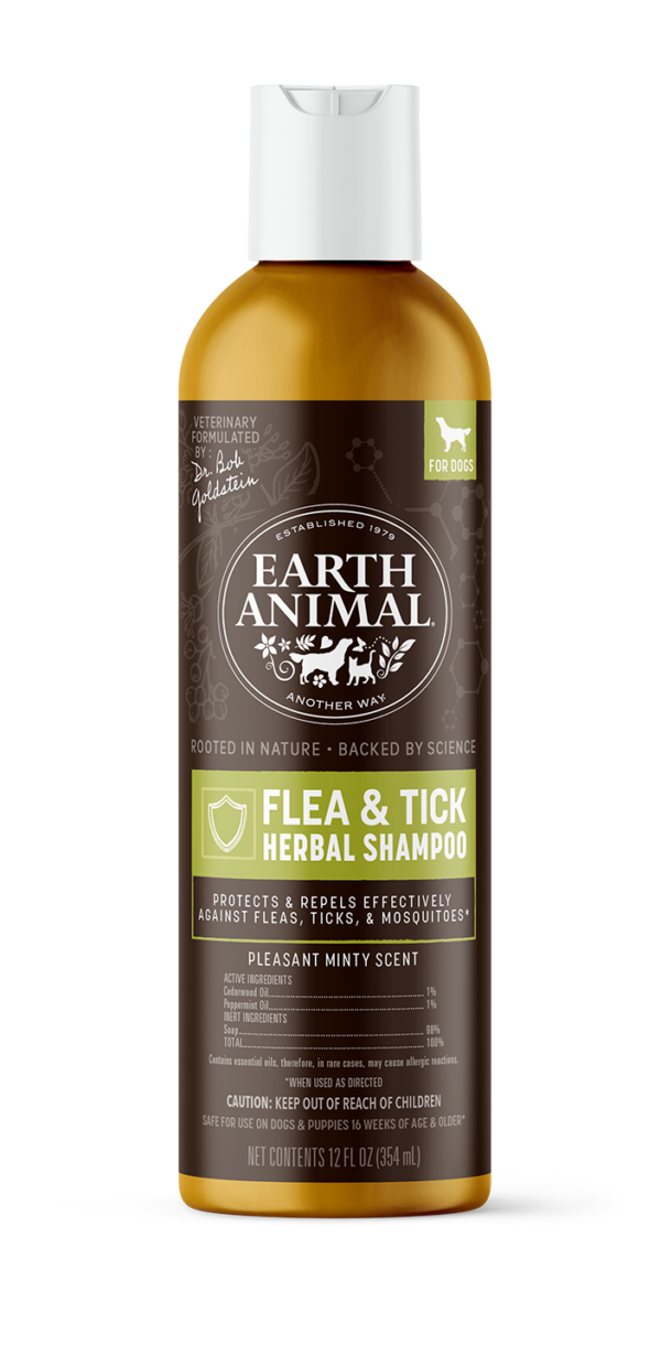 front view of a bottle of flea & tick herbal shampoo